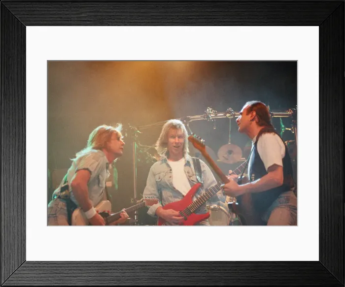 Framed Print : Status Quo in concert at the NEC in Birmingham, 11th December 1990. Our Picture Shows