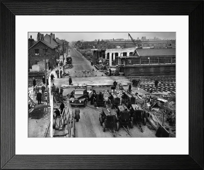 Framed Print : Construction crew seen here working against the clock to complete the laying of a new