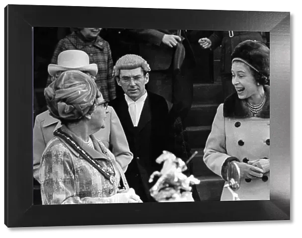 As Queen Elizabeth II leaves the Town Hall, Merthyr, she jokes with the Mayoress (Mrs C