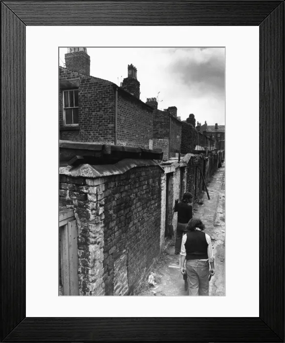 Framed Print : Workmen making general improvements to the narrow back passageways of a street in Everton