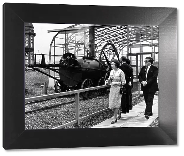 The Queen sees the working replica of Trevithicks Penydarren locomotive with curator