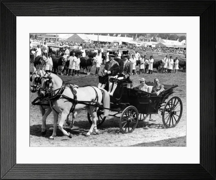 Framed Print : The Queen and Duke of Edinburgh arrive at the main showering to see the grand parade Framed Print : The Queen and Duke of Edinburgh arrive at the main showering to see the grand parade