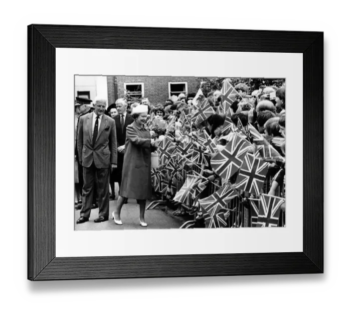 Framed Print : Flags flying as Her Majesty meets the people of Newtown. 12th July 1986 Framed Print : Flags flying as Her Majesty meets the people of Newtown. 12th July 1986