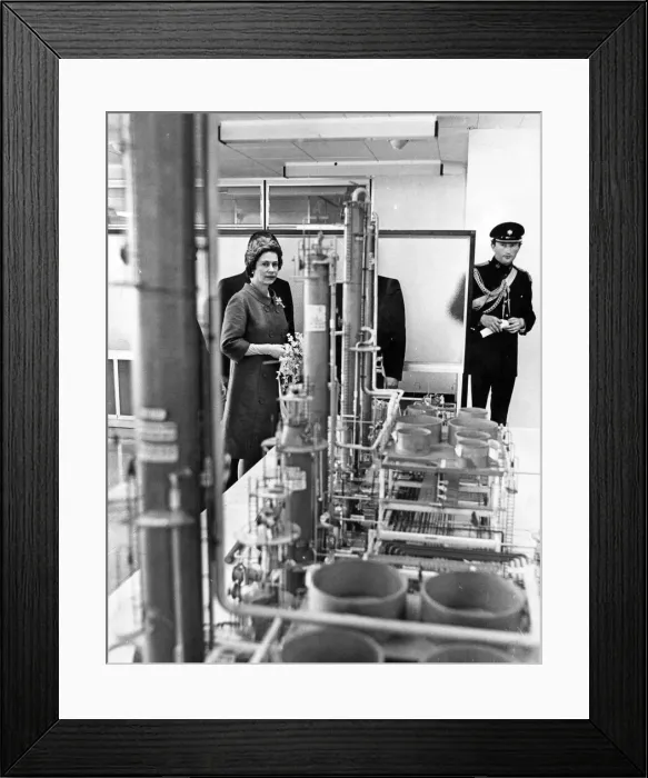 Framed Print : Queen Elizabeth II looks at a model of the new refinery at Milford Haven Framed Print : Queen Elizabeth II looks at a model of the new refinery at Milford Haven