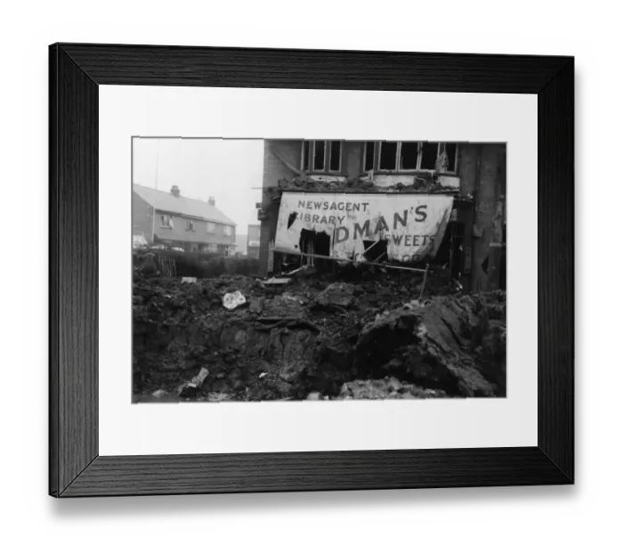 Framed Print : Crater and damage to the newsagent at the junction with Goddard Avenue and Woodlands Framed Print : Crater and damage to the newsagent at the junction with Goddard Avenue and Woodlands