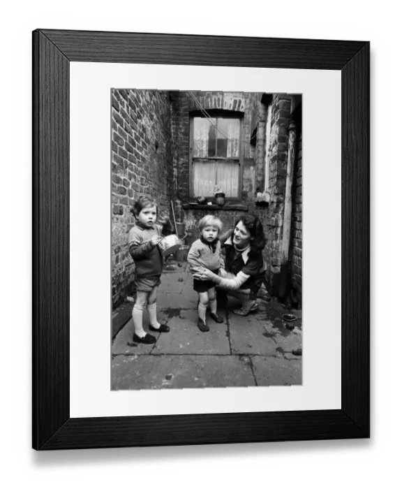 Framed Print : Slum housing in Salford, Greater Manchester. 30th January 1970