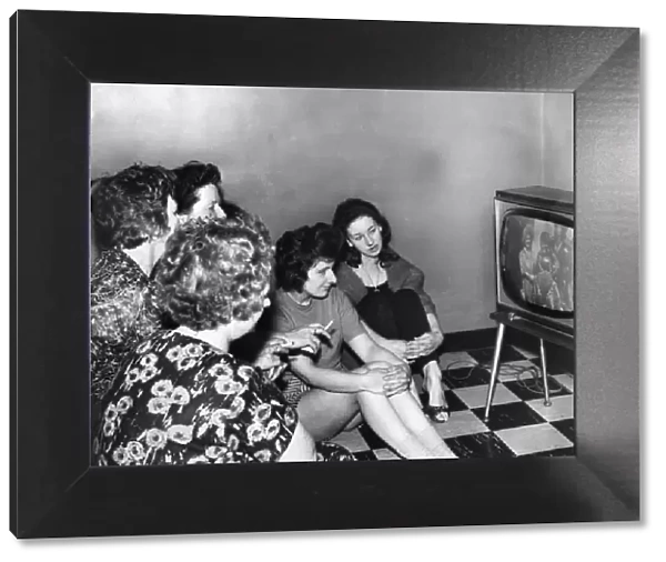 Hull housewives seen here watching the wedding of Princess Margaret on television at a