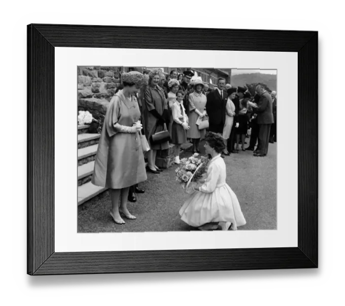 Framed Print : The Queen is presented with a bouquet of flowers at the U. D. C offices. 10th August 1963 Framed Print : The Queen is presented with a bouquet of flowers at the U. D. C offices. 10th August 1963