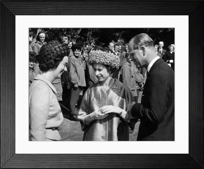 Framed Print : Queen Elizabeth II and the Duke of Edinburgh chatting with Miss A