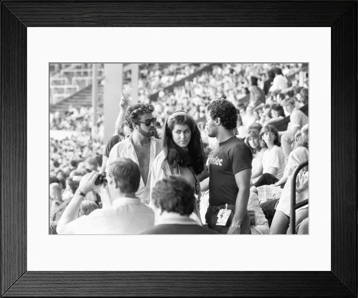 Framed Print : George Michael in the audience during the opening of the Live Aid Concert at Wembley Framed Print : George Michael in the audience during the opening of the Live Aid Concert at Wembley