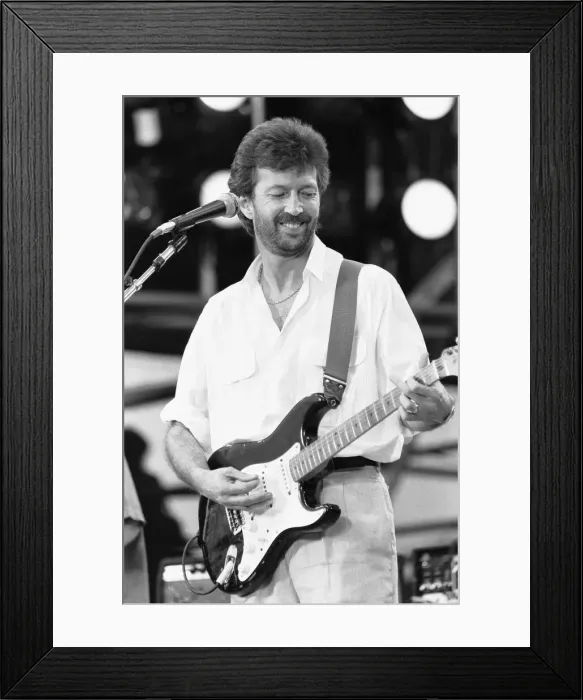 Framed Print : Eric Clapton performing on stage at the John F. Kennedy Stadium, Philadelphia Framed Print : Eric Clapton performing on stage at the John F. Kennedy Stadium, Philadelphia