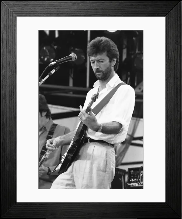Framed Print : Eric Clapton performing on stage at the John F. Kennedy Stadium, Philadelphia Framed Print : Eric Clapton performing on stage at the John F. Kennedy Stadium, Philadelphia