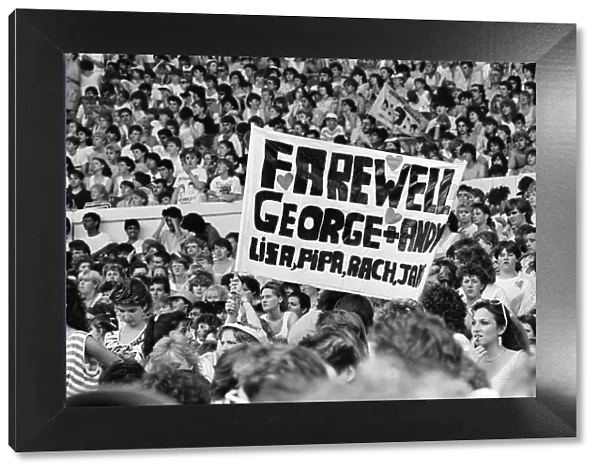A farwell banner amongst the 1000s of fans attending Wham