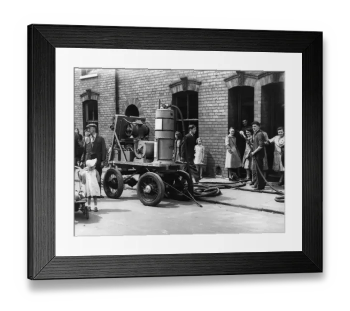 Framed Print : Giant vacuum cleaner seen here during the clean up following the Luftwaffe raid on Hull