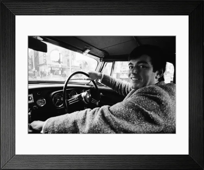 Framed Print : Tony Blackburn, the 22 year old Disc Jockey, on his way to work at The BBC in his red