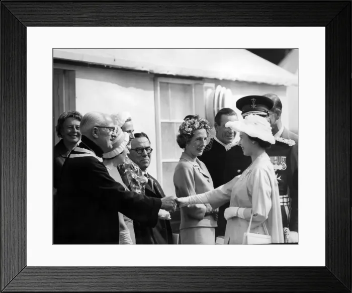 Framed Print : Queen Elizabeth II visiting Wales. The Queen shakes hands with Mr T W Thomas Framed Print : Queen Elizabeth II visiting Wales. The Queen shakes hands with Mr T W Thomas