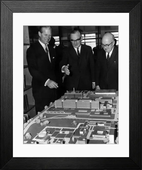 Framed Print : Prince Philip, the Duke of Edinburgh, looking at a model of the completed scheme Framed Print : Prince Philip, the Duke of Edinburgh, looking at a model of the completed scheme
