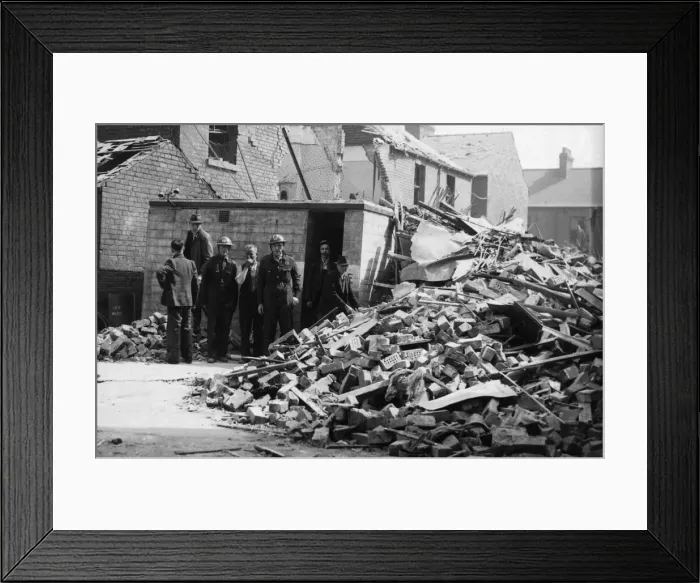 Framed Print : ARP personnel, Air raid warden help to search for survivors in an East Hull street after Framed Print : ARP personnel, Air raid warden help to search for survivors in an East Hull street after