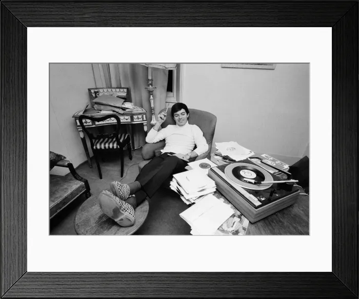 Framed Print : Tony Blackburn, the 22 year old Disc Jockey, at his flat in Knightsbridge, London Framed Print : Tony Blackburn, the 22 year old Disc Jockey, at his flat in Knightsbridge, London