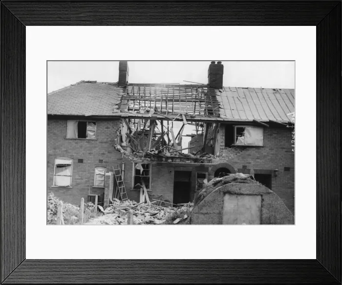 Framed Print : A terrace house in Stoneferry, Hull bares the scars of bomb damage following an overnight Framed Print : A terrace house in Stoneferry, Hull bares the scars of bomb damage following an overnight