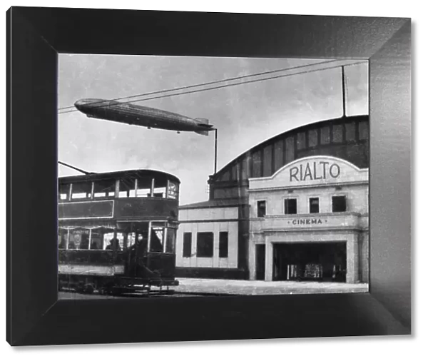 The R38 Airship seen above the Rialto Cinema in Beverly Street, Hull. 21st June 1921