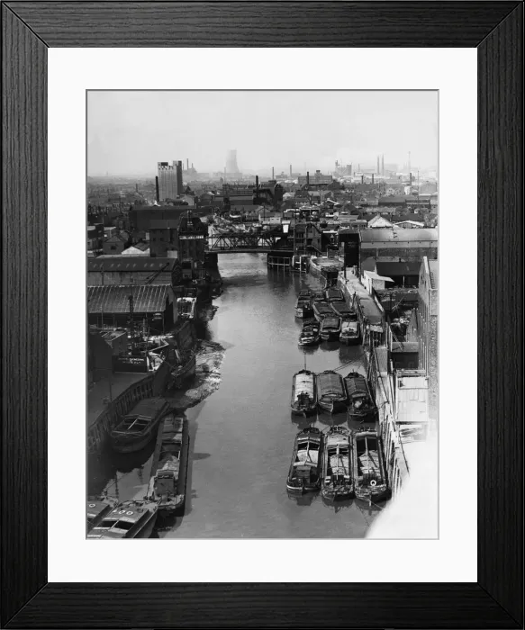 Framed Print : Tugs, lighters and barges moored to the staithes awaiting to unload their goods into