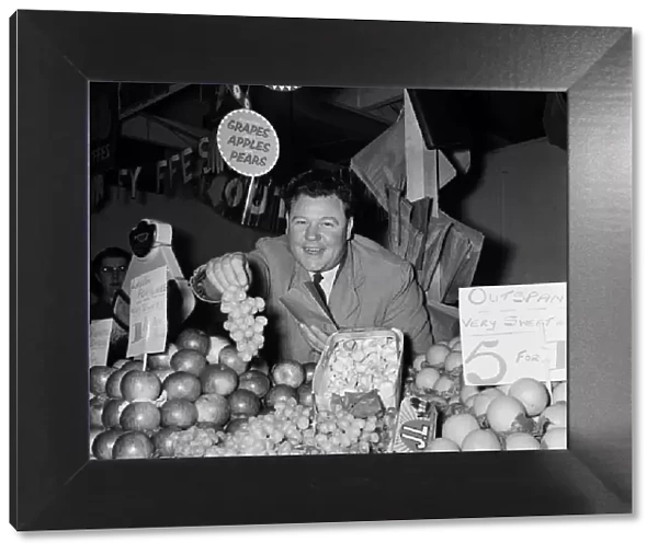 Market stall holder in Wigan. 3rd November 1960