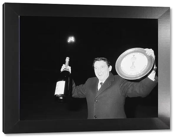 Graham Taylor, Aston Villa manager is presented with a jeroboam of champagne