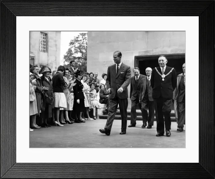 Framed Print : Prince Philip visiting Wales. A smiling Duke of Edinburgh leaves the college after