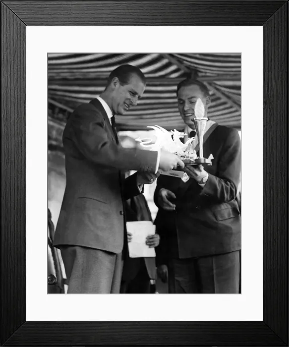 Framed Print : Prince Philip visiting Wales. A scroll and electric lamp stand is presented to the Duke Framed Print : Prince Philip visiting Wales. A scroll and electric lamp stand is presented to the Duke