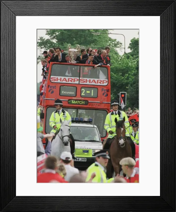 Framed Print : Manchester United team on open top bus May 1999 during their homecoming tour of