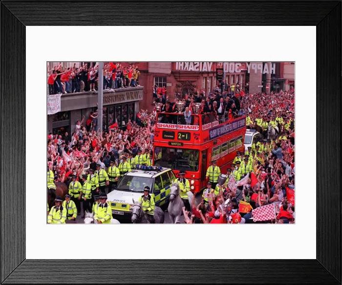Framed Print : Manchester United Homecoming on an open-top bus May 1999 mobbed by fans at the start of