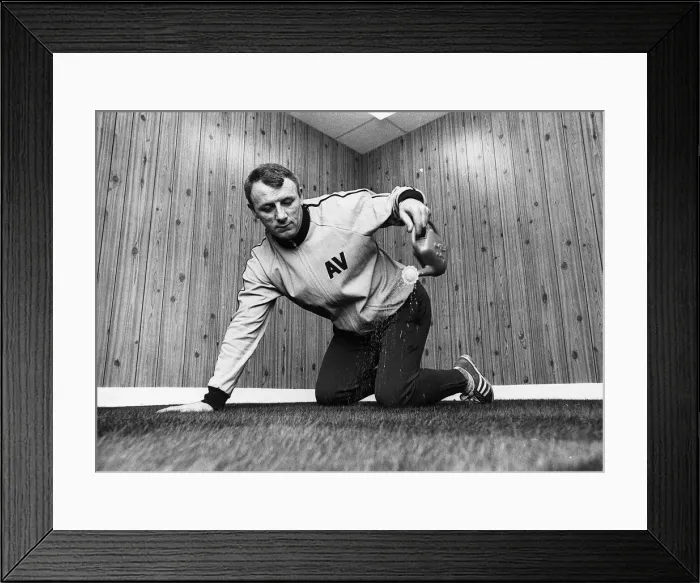 Framed Print : Tommy Docherty football manager Aston Villa FC watering carpet in his office watering can Framed Print : Tommy Docherty football manager Aston Villa FC watering carpet in his office watering can
