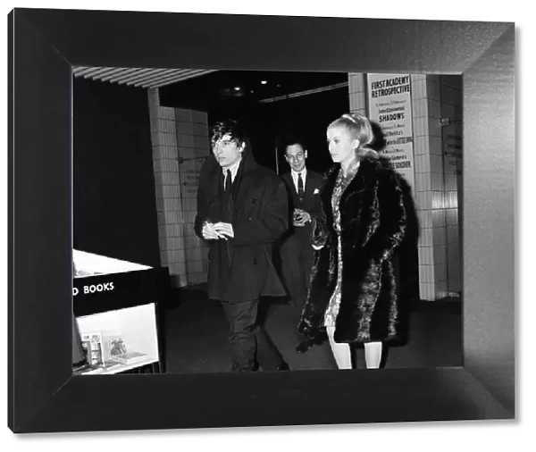 Catherine Deneuve, actress, and husband fashion photographer David Bailey arrive at