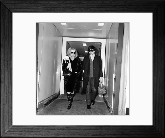 Framed Print : Catherine Deneuve, actress, and husband fashion photographer David Bailey arrive Framed Print : Catherine Deneuve, actress, and husband fashion photographer David Bailey arrive