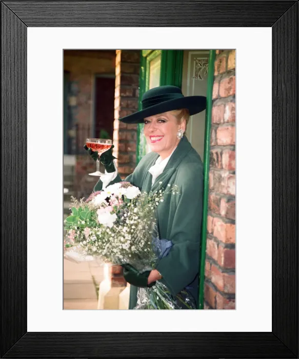 Framed Print : Julie Goodyear is pictured outside The Rovers Return on the set of Coronation Street Framed Print : Julie Goodyear is pictured outside The Rovers Return on the set of Coronation Street
