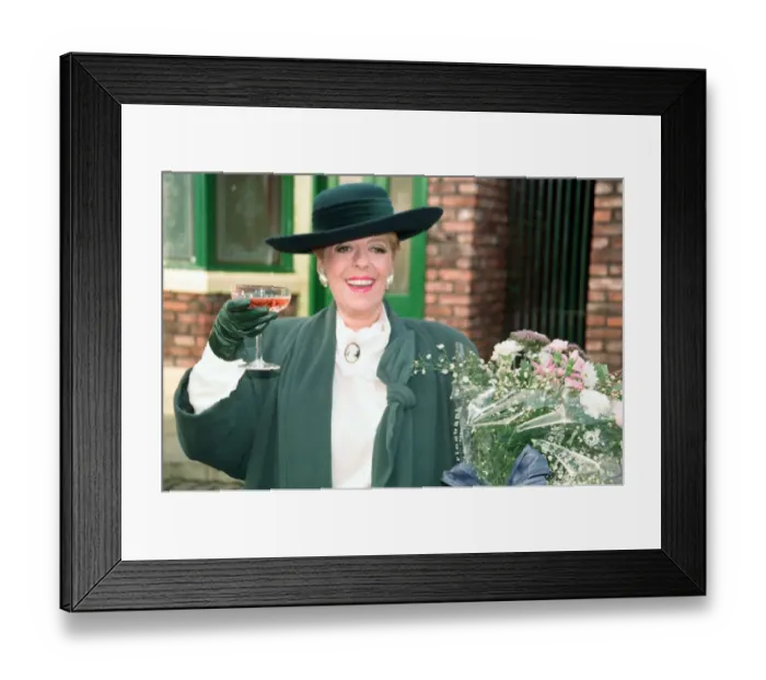 Framed Print : Julie Goodyear is pictured outside The Rovers Return on the set of Coronation Street Framed Print : Julie Goodyear is pictured outside The Rovers Return on the set of Coronation Street