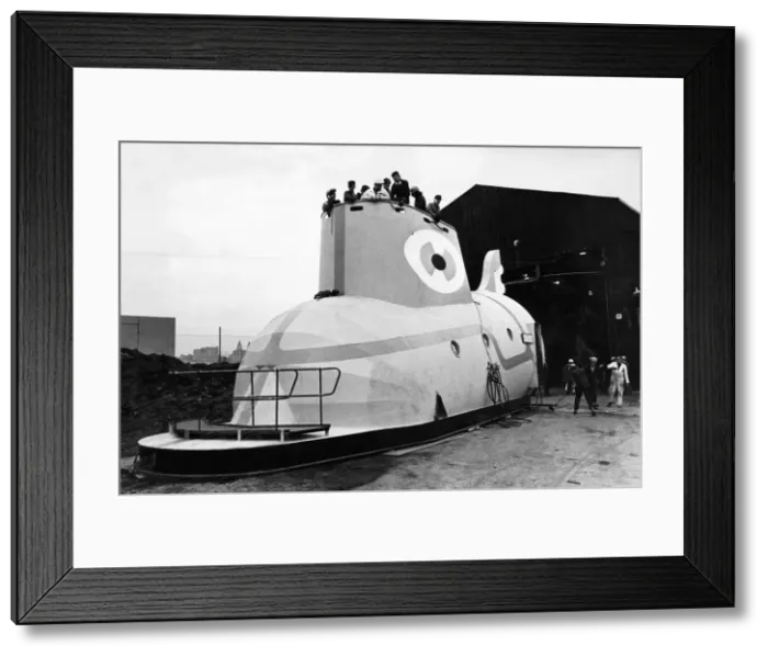 Framed Print : The Yellow Submarine in Liverpool, a large model representation of the submarine featured Framed Print : The Yellow Submarine in Liverpool, a large model representation of the submarine featured