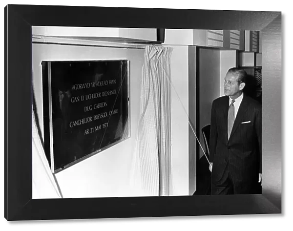 Prince Philip visiting Wales. The Duke of Edinburgh unveils a commemorative plaque during