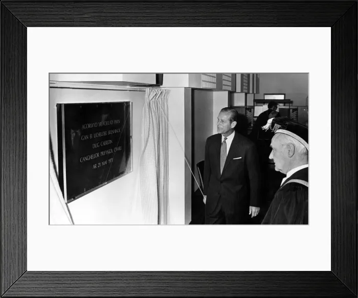Framed Print : Prince Philip visiting Wales. The Duke of Edinburgh unveils a commemorative plaque during Framed Print : Prince Philip visiting Wales. The Duke of Edinburgh unveils a commemorative plaque during