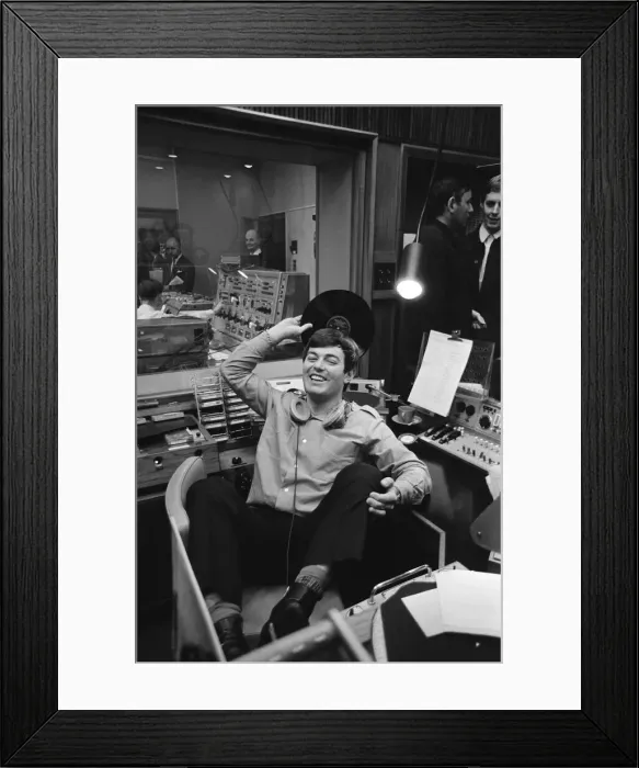 Framed Print : Tony Blackburn, the 22 year old Disc Jockey, finishes his broadcast of the very first Framed Print : Tony Blackburn, the 22 year old Disc Jockey, finishes his broadcast of the very first