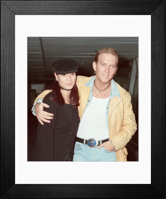 Framed Print : Matt Goss from the pop group Bros, and his girlfriend, model Melanie Sykes arrive Framed Print : Matt Goss from the pop group Bros, and his girlfriend, model Melanie Sykes arrive
