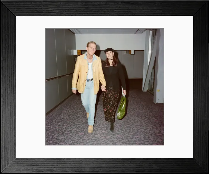 Framed Print : Matt Goss from the pop group Bros, and his girlfriend, model Melanie Sykes arrive Framed Print : Matt Goss from the pop group Bros, and his girlfriend, model Melanie Sykes arrive