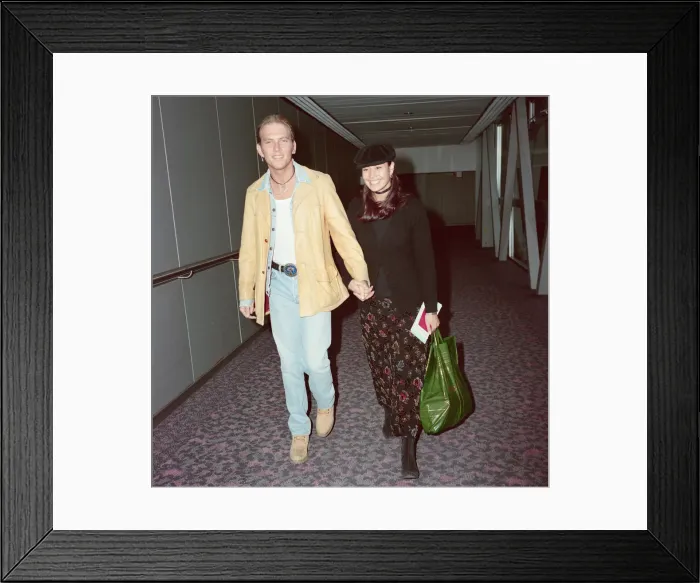Framed Print : Matt Goss from the pop group Bros, and his girlfriend, model Melanie Sykes arrive Framed Print : Matt Goss from the pop group Bros, and his girlfriend, model Melanie Sykes arrive