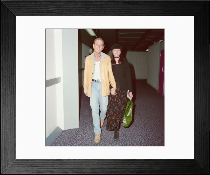 Framed Print : Matt Goss from the pop group Bros, and his girlfriend, model Melanie Sykes arrive Framed Print : Matt Goss from the pop group Bros, and his girlfriend, model Melanie Sykes arrive