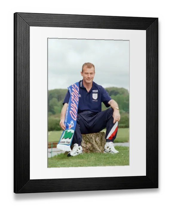 Framed Print : Alan Shearer wearing an England scarf. 29th April 1997