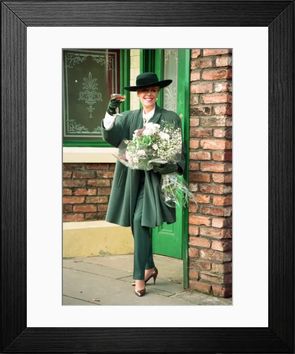 Framed Print : Julie Goodyear is pictured outside The Rovers Return on the set of Coronation Street Framed Print : Julie Goodyear is pictured outside The Rovers Return on the set of Coronation Street