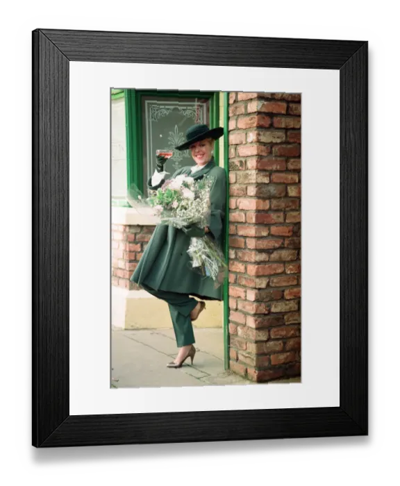 Framed Print : Julie Goodyear is pictured outside The Rovers Return on the set of Coronation Street