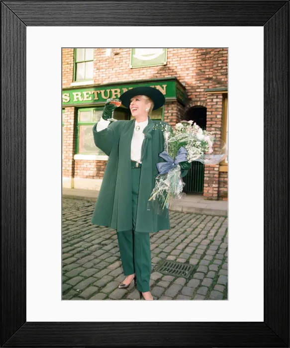 Framed Print : Julie Goodyear is pictured outside The Rovers Return on the set of Coronation Street Framed Print : Julie Goodyear is pictured outside The Rovers Return on the set of Coronation Street