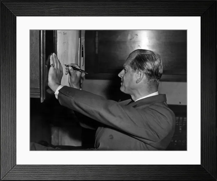 Framed Print : HRH Prince Philip, Duke of Edinburgh signing the visitors book at Barry Framed Print : HRH Prince Philip, Duke of Edinburgh signing the visitors book at Barry